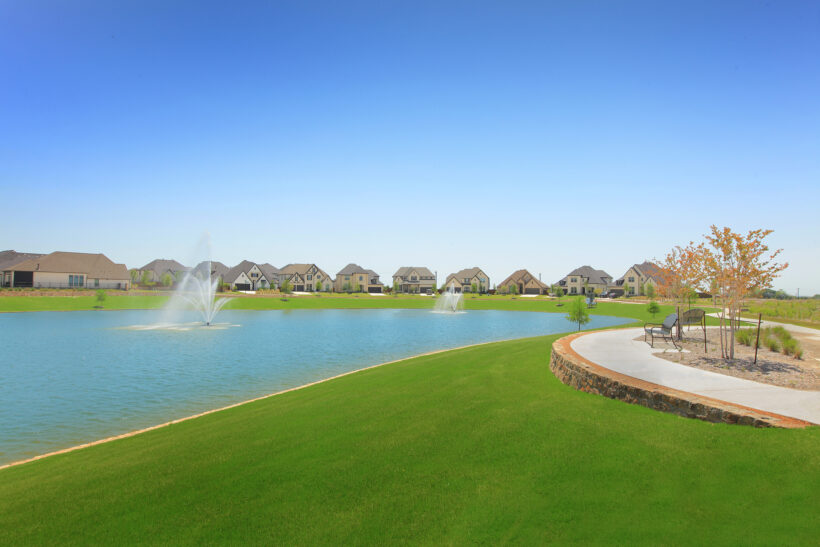 Trail and lake in The Parks at Wilson Creek community in Celina